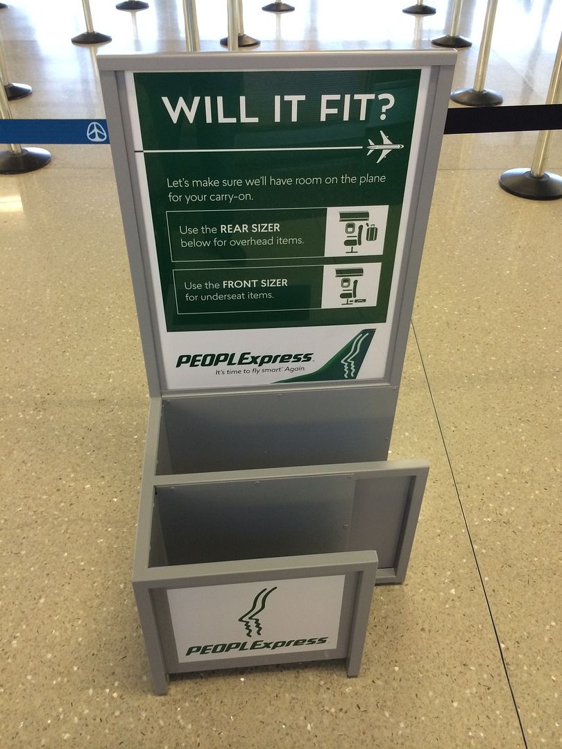 frontier checked baggage size